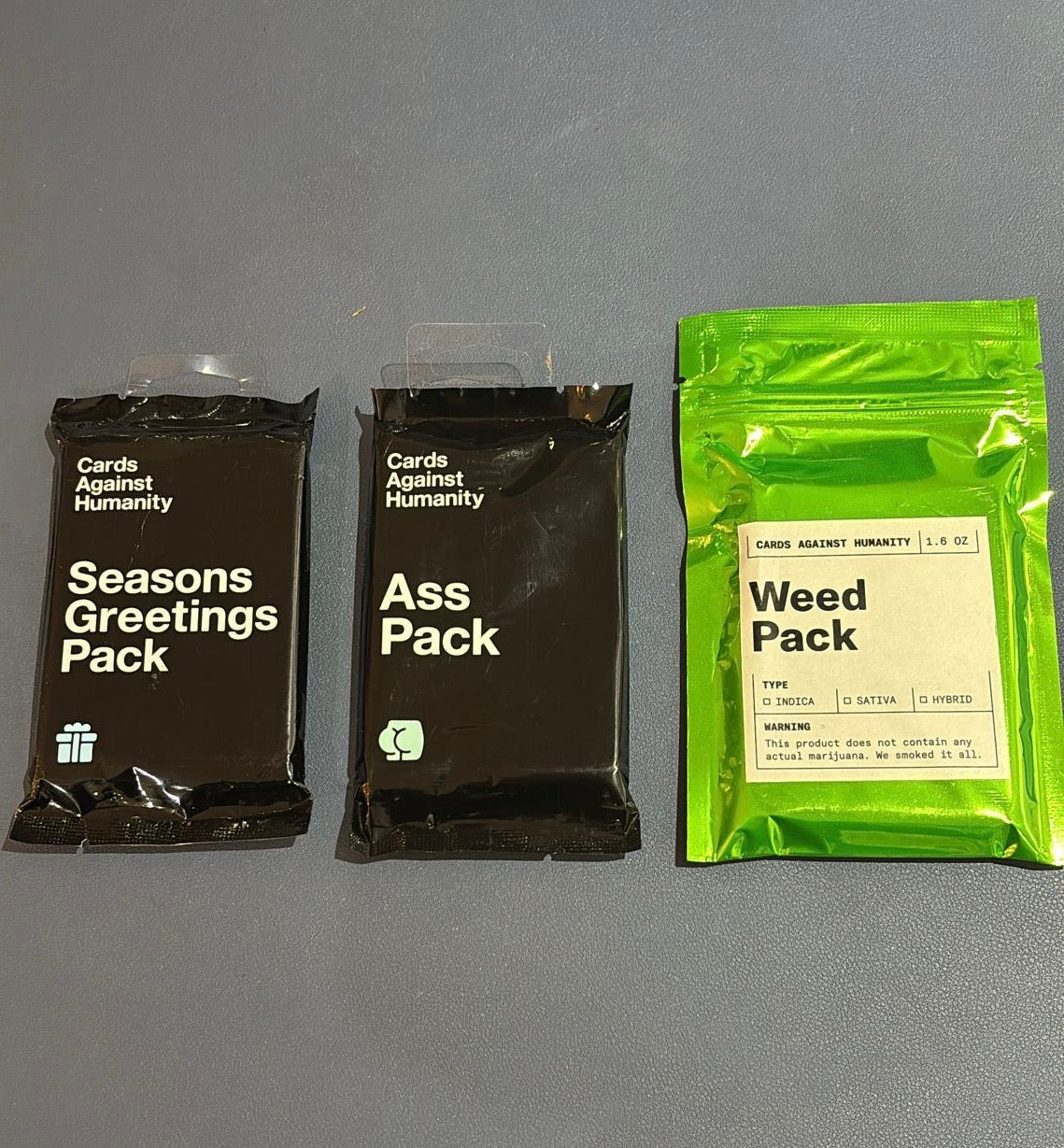 Cards Against Humanity - Mini Expansions: Ass Pack + Seasons Greetings Pack + Weed Pack